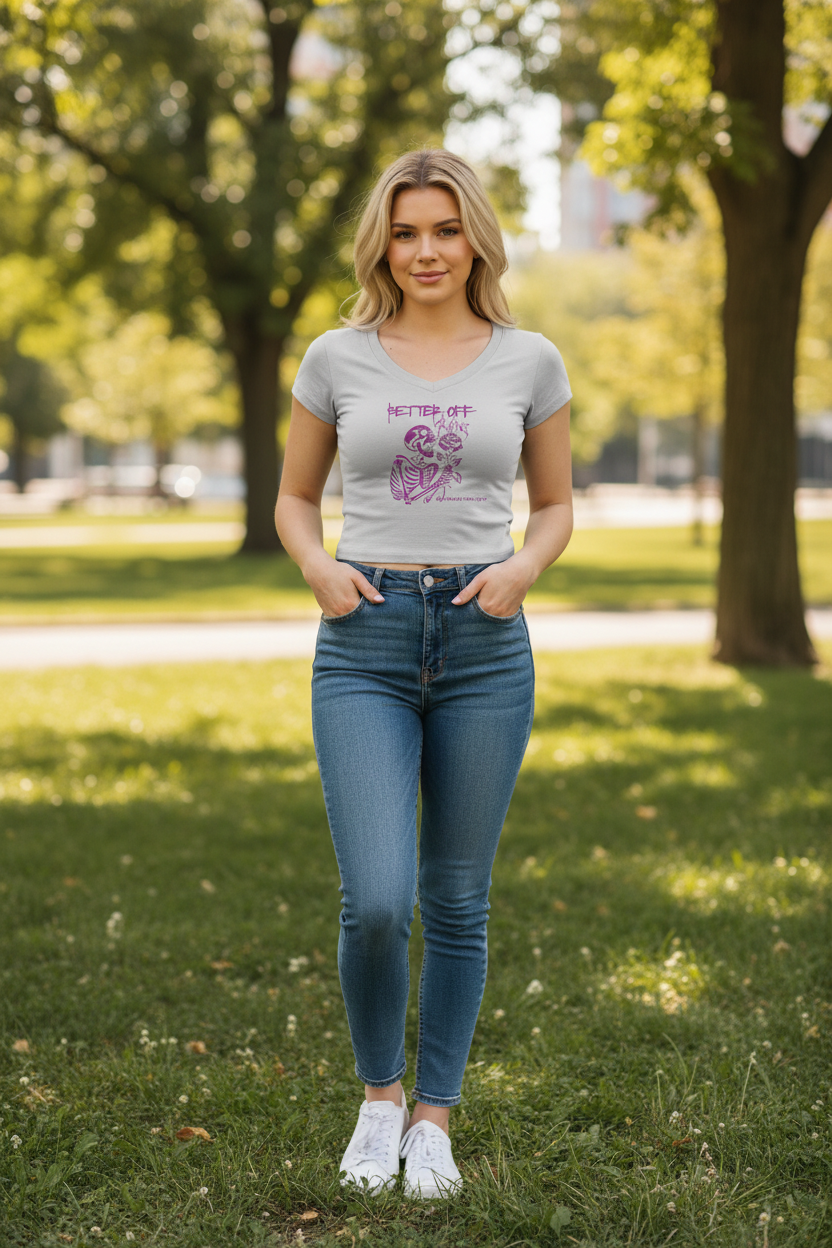 Gray t-shirt with purple skeleton and rose design on a white background
