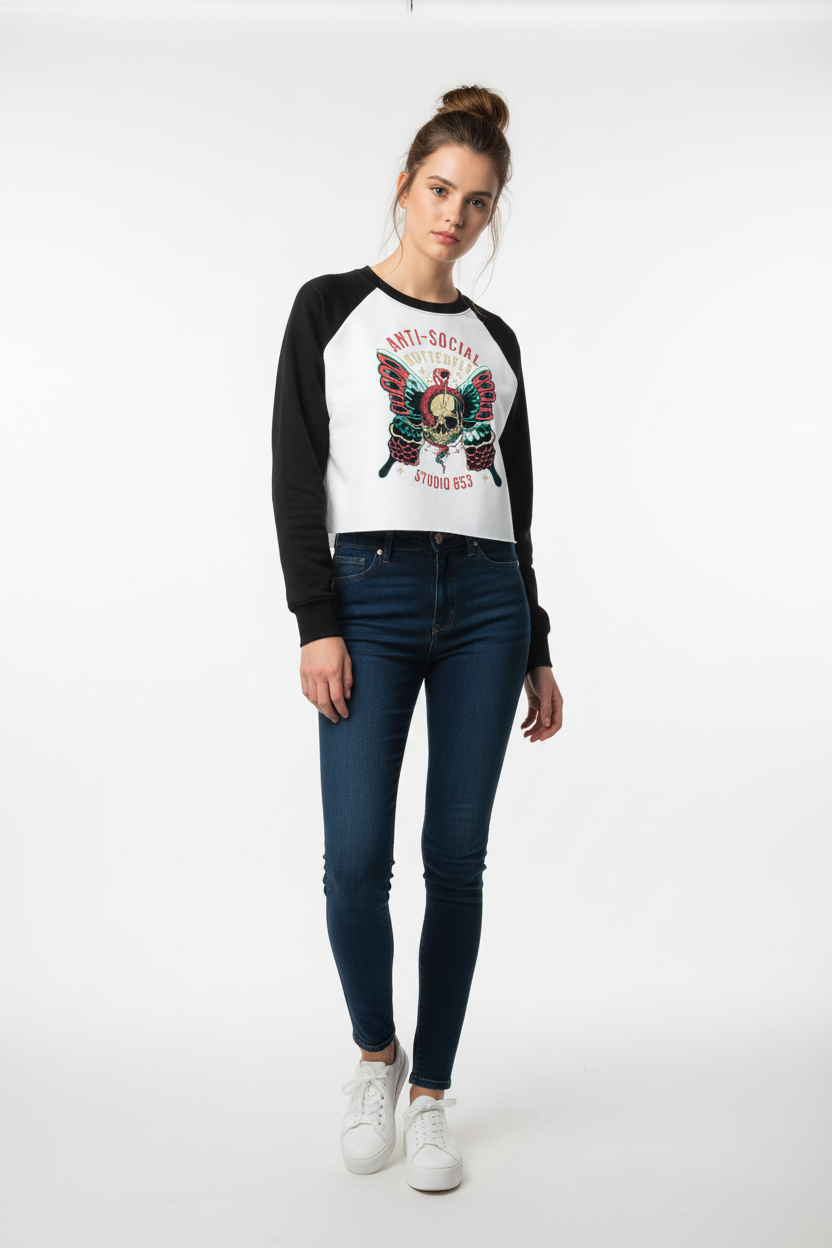 White and black crop top with graphic design on a white background